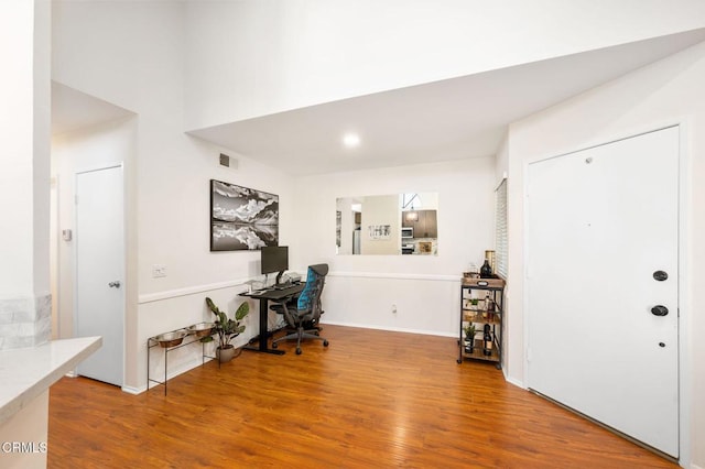 office area with wood-type flooring