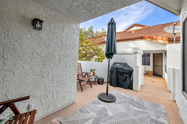 view of patio / terrace featuring a grill