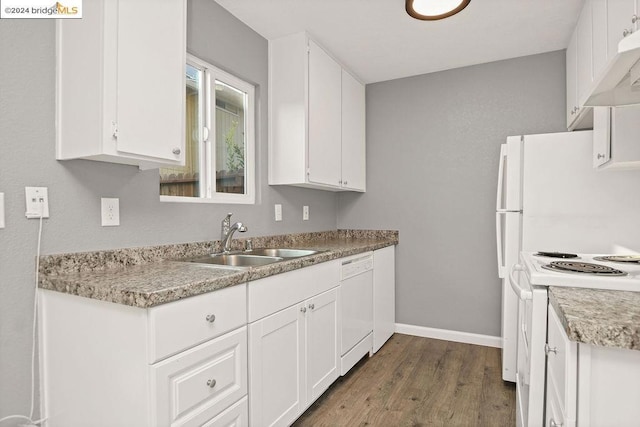 kitchen featuring white appliances, dark hardwood / wood-style flooring, white cabinets, and sink