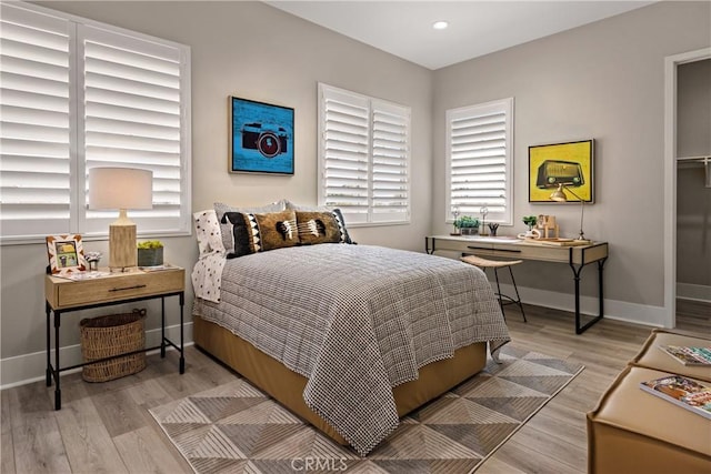 bedroom featuring light hardwood / wood-style floors