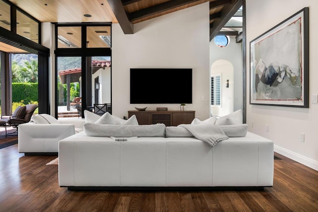 living room with dark wood-type flooring, wooden ceiling, and beam ceiling