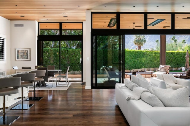 doorway featuring dark hardwood / wood-style flooring and wood ceiling