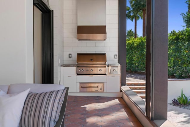 view of patio / terrace with an outdoor kitchen and area for grilling