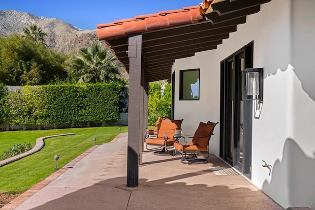 view of patio featuring a mountain view