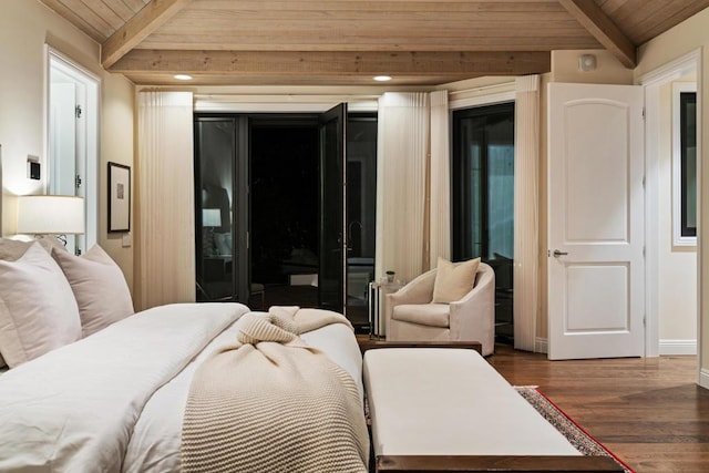 bedroom featuring dark wood-type flooring, wood ceiling, and lofted ceiling with beams