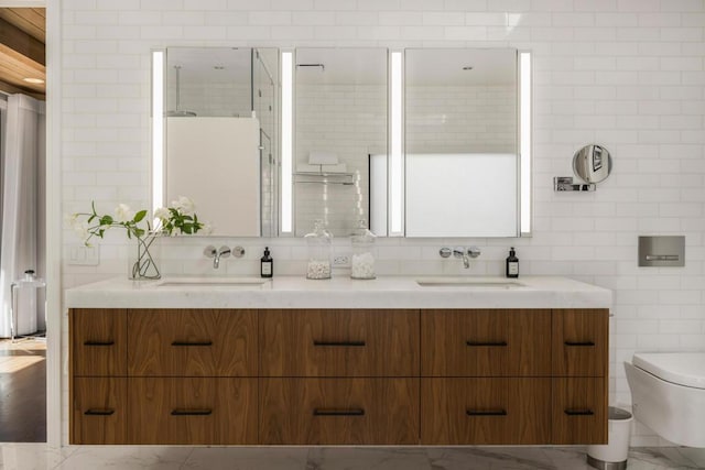 bathroom with backsplash, tile walls, toilet, and vanity