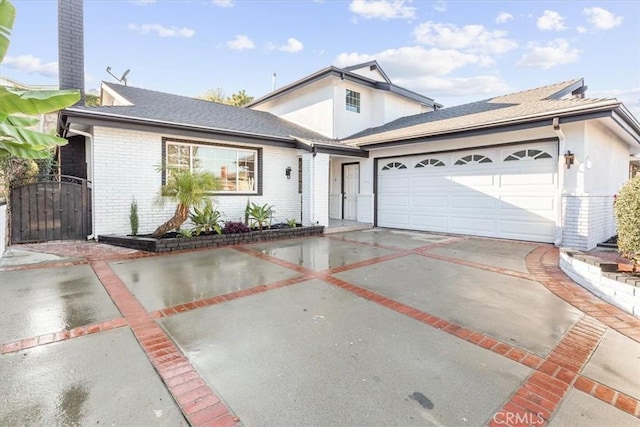 front of property featuring a garage