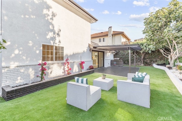 view of yard featuring an outdoor hangout area and an outdoor kitchen