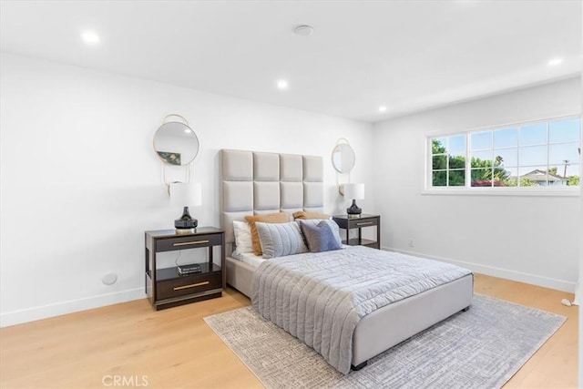 bedroom featuring light hardwood / wood-style flooring