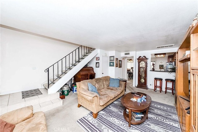 living room featuring light colored carpet