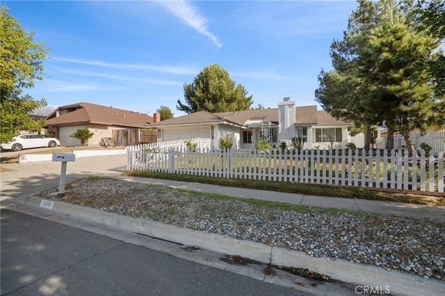 single story home featuring a garage