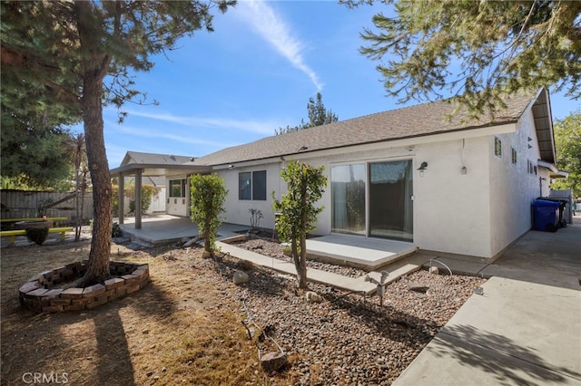 rear view of house with a patio area