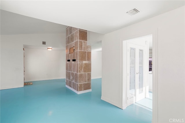 interior space with concrete flooring