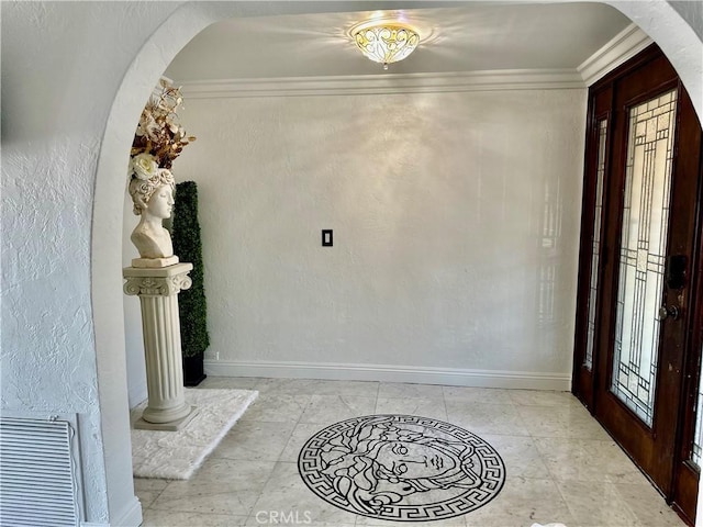 entrance foyer with crown molding