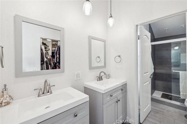 bathroom with vanity and an enclosed shower