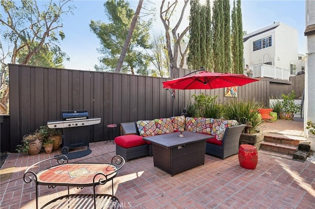 view of patio / terrace featuring outdoor lounge area and area for grilling