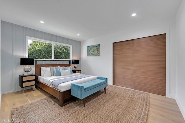 bedroom with light hardwood / wood-style floors