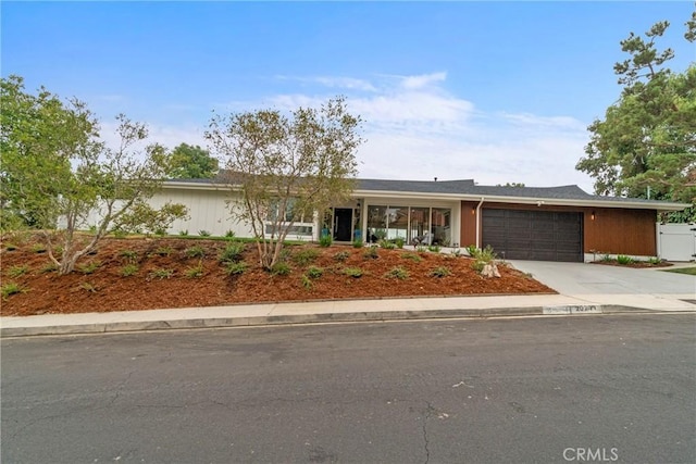 single story home with a garage