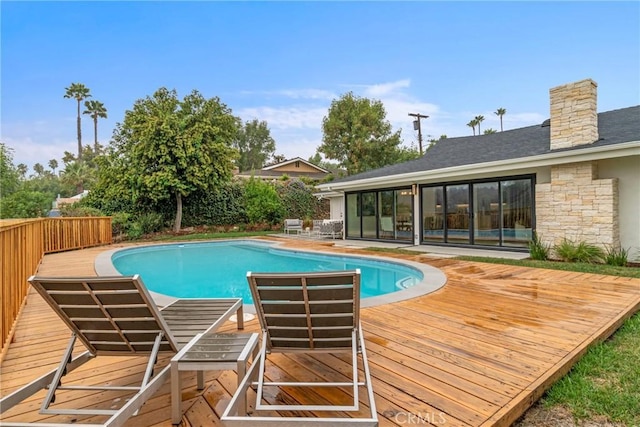 view of pool featuring a deck