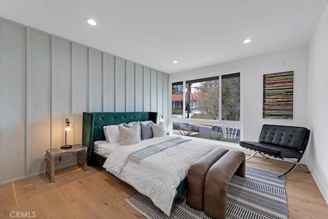 bedroom with light hardwood / wood-style flooring