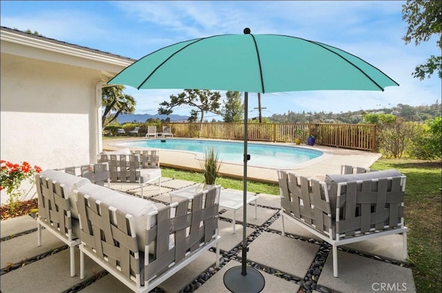 view of pool featuring a patio