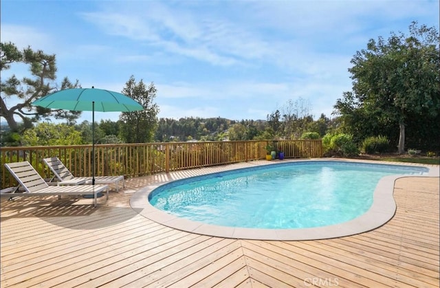 view of pool featuring a deck