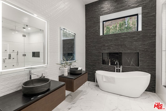 bathroom featuring a bathtub and vanity