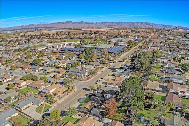 drone / aerial view featuring a mountain view