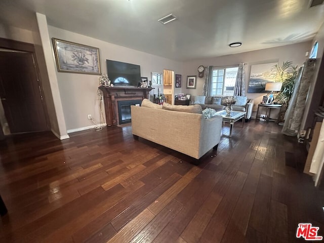 living room featuring dark hardwood / wood-style flooring