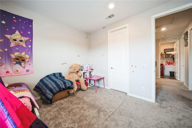 bedroom featuring carpet