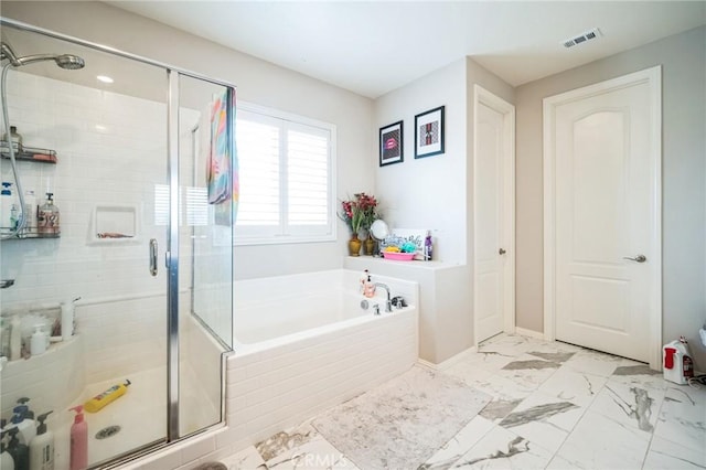 bathroom featuring plus walk in shower