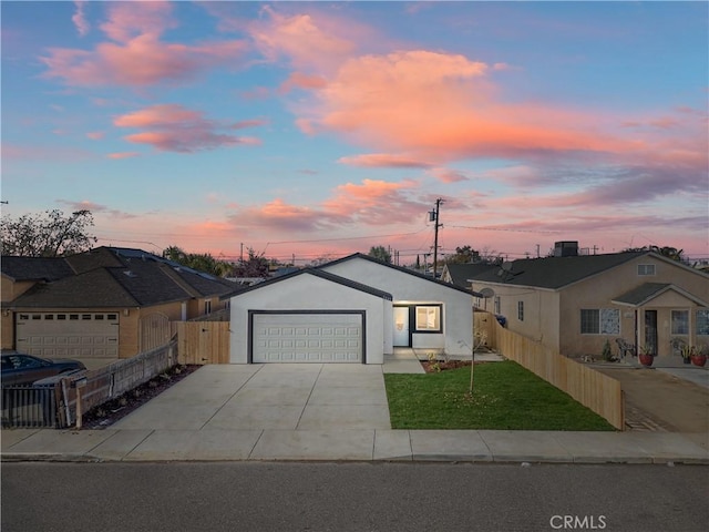 view of front of property with a garage