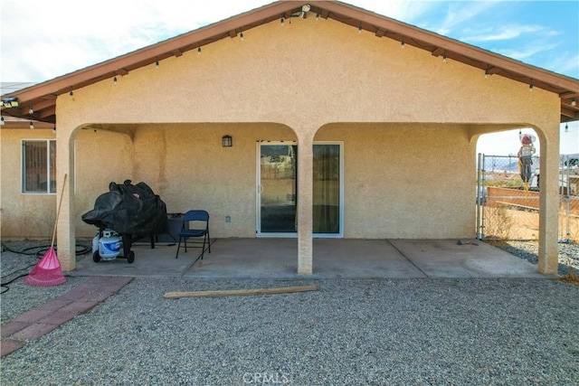 back of house featuring a patio