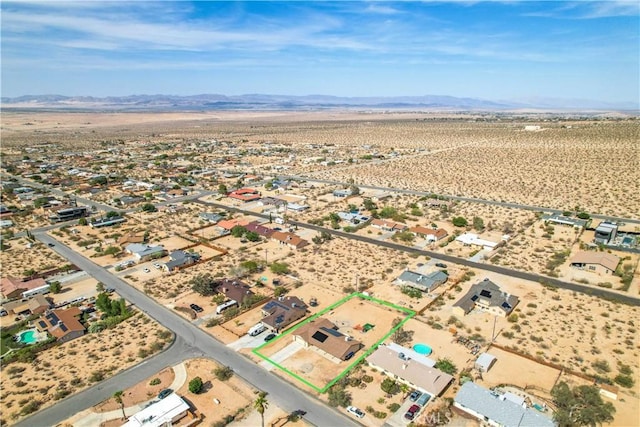 aerial view featuring a mountain view