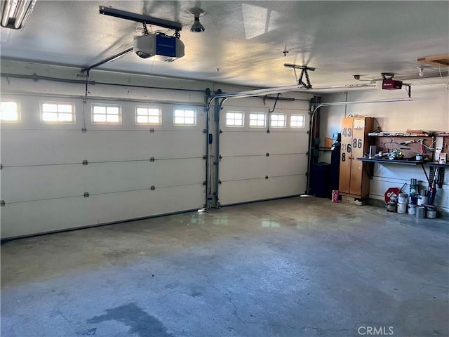 garage featuring a garage door opener