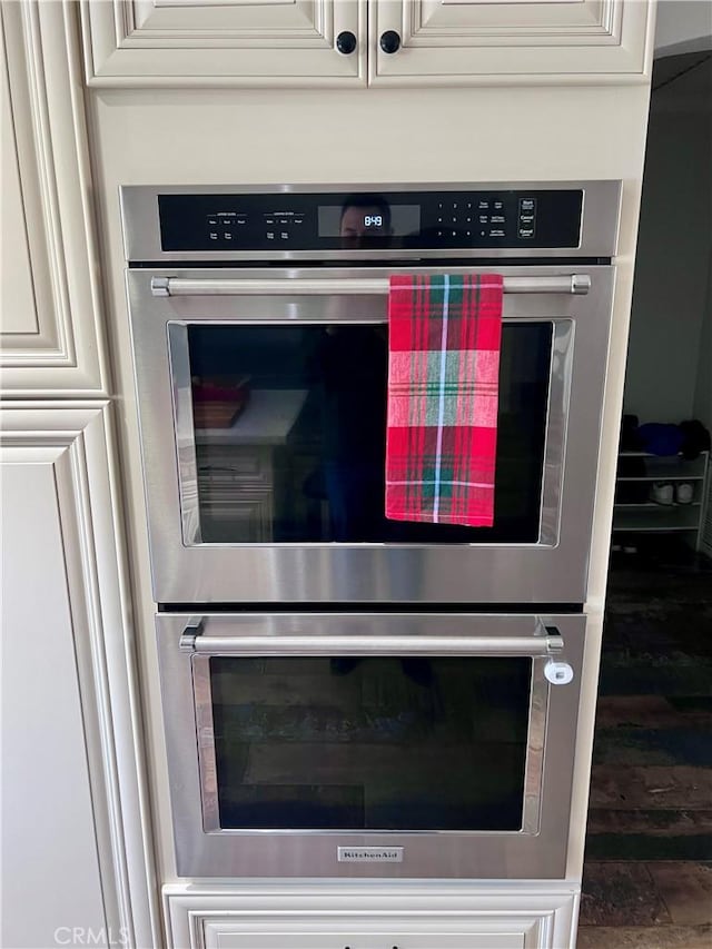 room details featuring stainless steel double oven