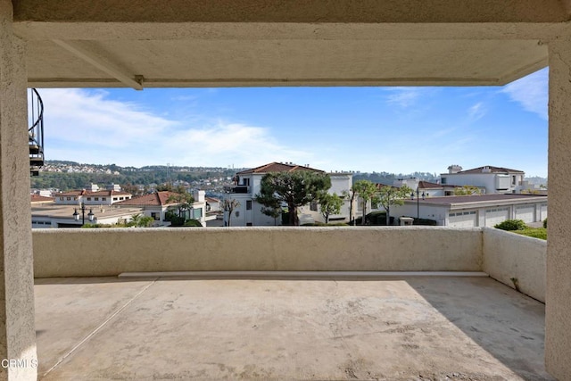 view of patio / terrace with a balcony