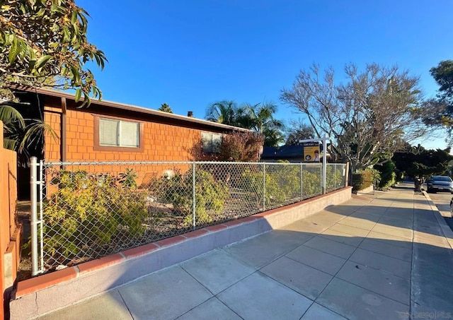 view of side of home featuring a patio