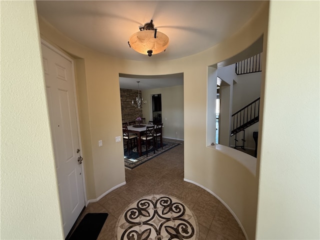 hallway featuring tile patterned floors