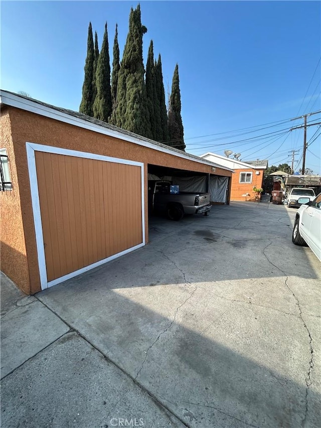 garage with a carport