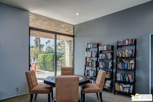 dining area with carpet