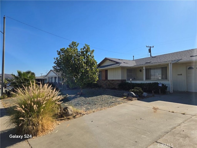 view of side of property with a garage