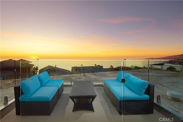 2680 Victoria Dr, Laguna Beach, CA 92651 - patio terrace at dusk with a water view and an outdoor hangout area