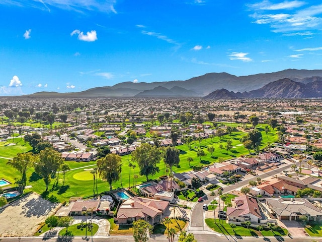 birds eye view of property featuring a mountain view