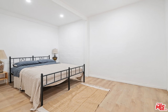 bedroom with light hardwood / wood-style flooring