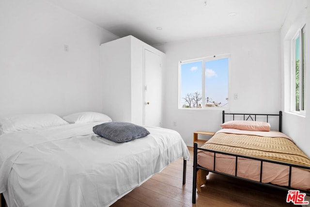 bedroom featuring hardwood / wood-style floors