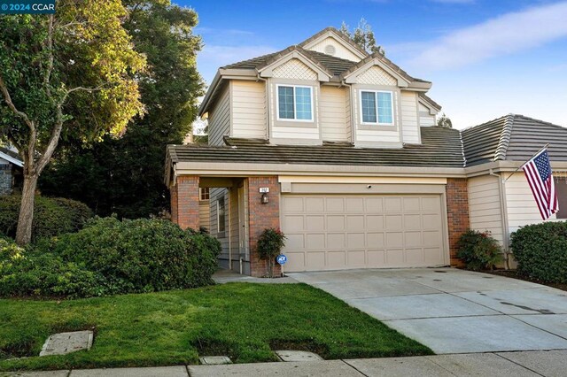 front of property with a garage