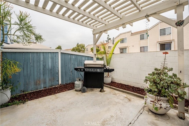 view of patio / terrace featuring grilling area and a pergola