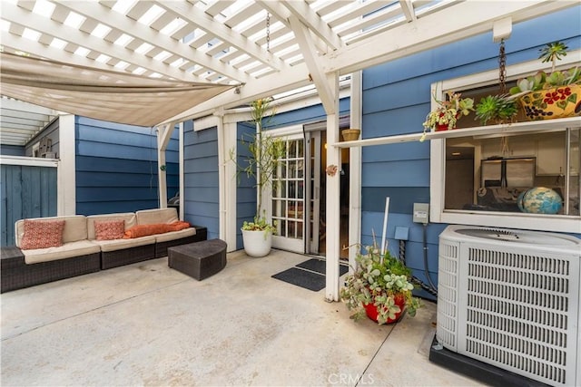 view of patio featuring central AC unit, a pergola, and an outdoor hangout area