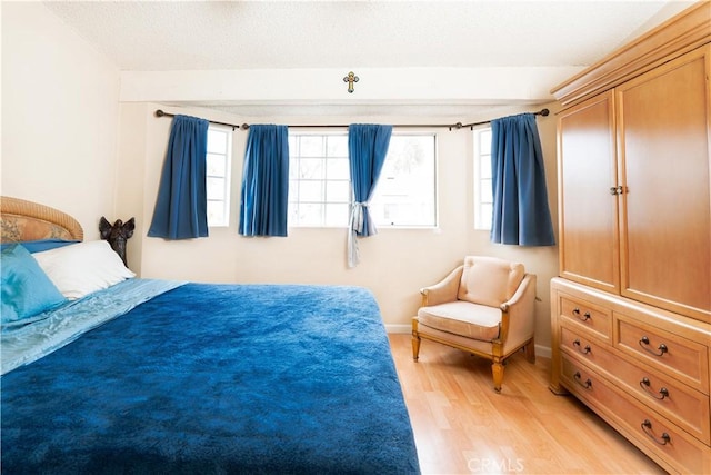 bedroom featuring light hardwood / wood-style floors